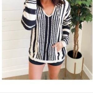 NWT sweater w/ a hood. Size M